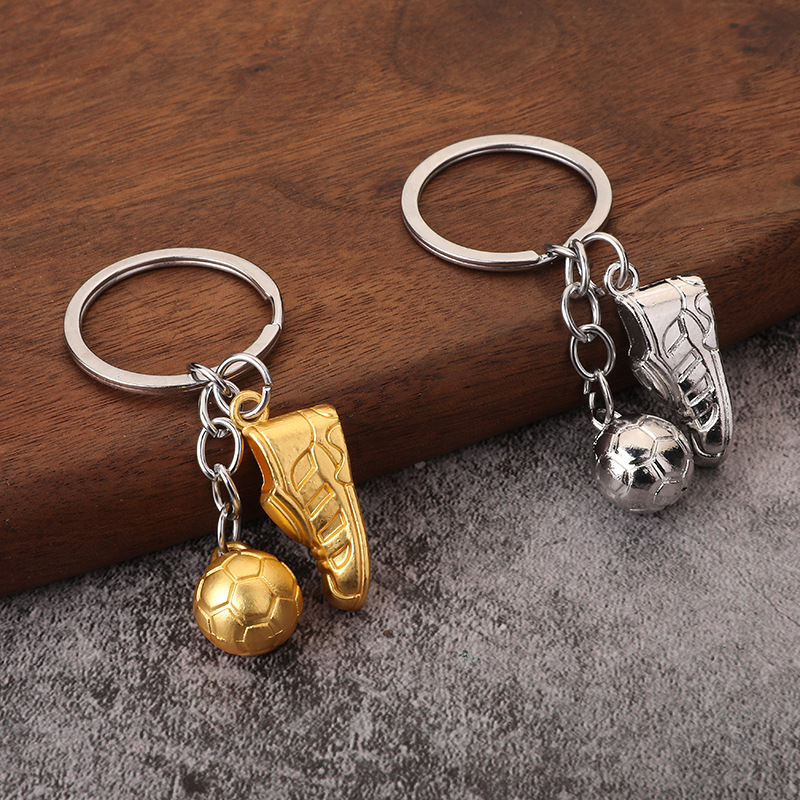 Home 257 soccer cleats and ball keychain